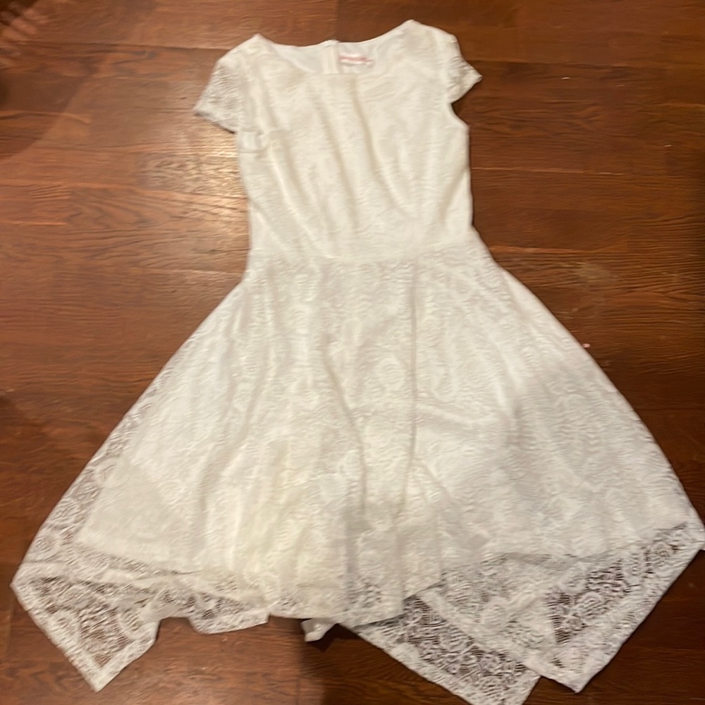 Has never been worn is a nice light Slowey dress